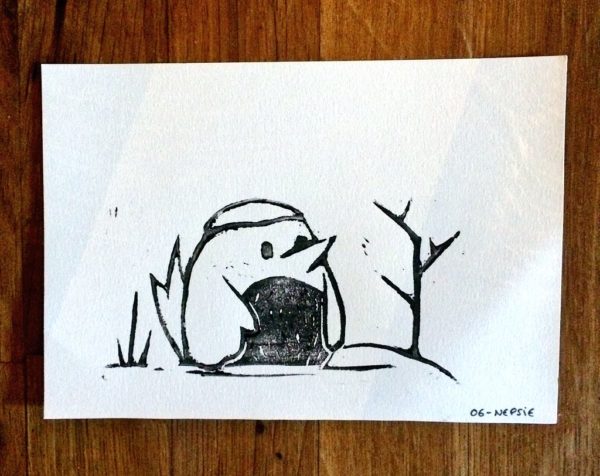 Linogravure d'un oiseau sous la neige pour Au fond du trou - format carte postale - Nepsie